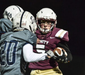 Trinity heads to the postseason after 31-14 win over Madonna